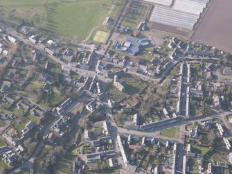 Oblique aerial view of Dunning village, looking NNW.