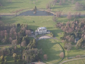 Oblique aerial view of Newliston House, looking N.