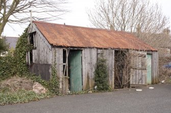 Timber shed with corrugated iron roof, view from south west