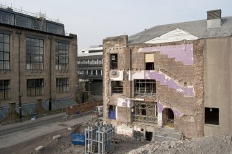 View to north-east from cherrypicker showing exposed east wall and west end of main School of Art building, Student Union, Glasgow School of Art, Renfrew Street, Glasgow.