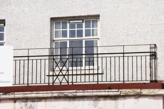 Detail of south facing window and iron railings