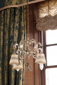 Interior. 1st floor, saloon, detail of smaller light fitting