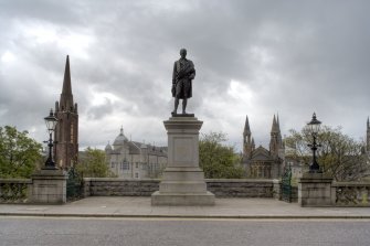 View from Union Terrace looking north east showing entrances into gardens and Burns statue.