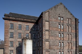 Spinning mill, view of upper floors from foof of bonded warehouse to west