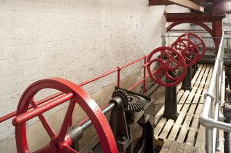 Interior. Turbine house, upper level, detail of lade control wheels