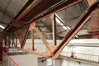 Interior. Turbine house, upper level, view of roof truss
