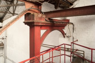 Interior. Turbine house, upper level, detail of cast iron arch