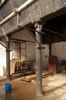 Interior. Turbine house, view of cast iron columns and underside of lade