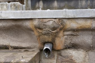 Parapet of tower, detail of carved water spout at west end