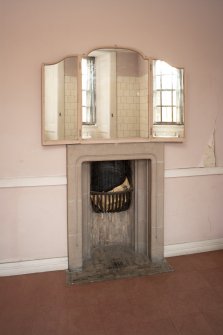 Interior. 2nd floor, north bathroom, view of fireplace with mirror above