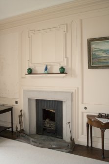 Interior. 2nd floor, bedroom (no. 8 on plan), view of fireplace