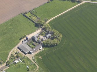 Oblique aerial view of Balcomie Castle, taken from the NW.