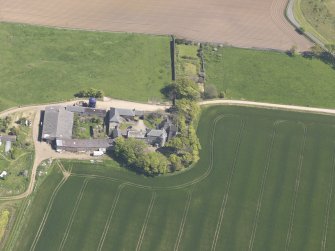 Oblique aerial view of Balcomie Castle, taken from the W.