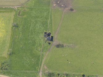 Oblique aerial view of Pittarthie Castle, taken from the E.