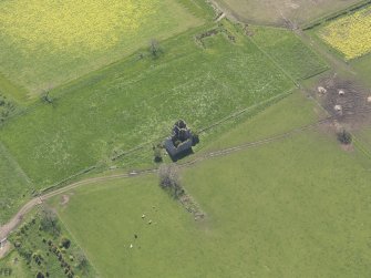 Oblique aerial view of Pittarthie Castle, taken from the NE.
