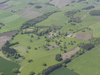 General oblique aerial view of Pitlour House policies centred on the house, taken from the E.