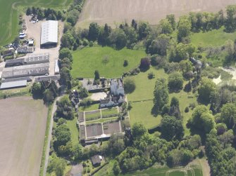 Oblique aerial view of Balmanno Castle, taken from the N.