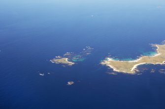 General oblique aerial view of the Monach Islands, taken from the SSE.