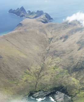 General oblique aerial view of St Kilda, centred on Gleann Mor and the island of Dun, taken from the N.