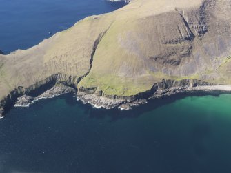General oblique aerial view of St Kilda, centred on Tobar Na Cille and St Brianan's Church, taken from the E.