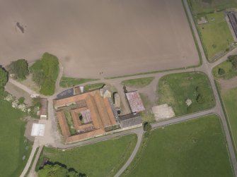 Oblique aerial view of Collairnie Castle and steading, taken from the SSE.