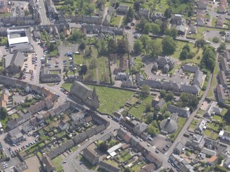 Oblique aerial view of Old and St Michael of Tarvit Parish Church, taken from the W.