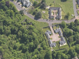 Oblique aerial view of Ballumbie Castle, taken from the WNW.