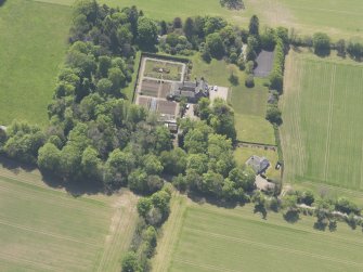 Oblique aerial view of Balmanno House, taken from the NNE.