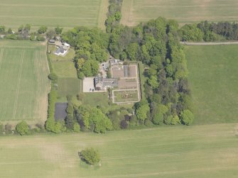 Oblique aerial view of Balmanno House, taken from the SSW.