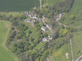 Oblique aerial view of Benholm Parish Church, taken from the SE.