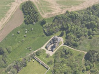 Oblique aerial view of Benholm Castle, taken from the NW.