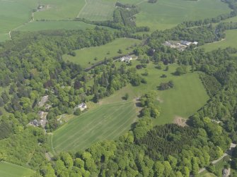 General oblique aerial view of Cortachy Castle Policies centred on Cortachy Castle, taken from the SW.