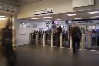View of ticket barriers into entrance hall.