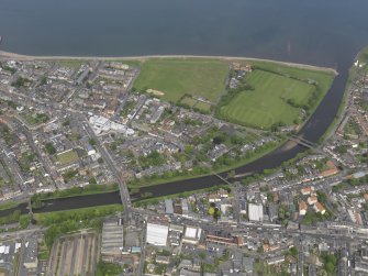General oblique aerial view of Musselburgh centred on New Bridge, taken from the SE.