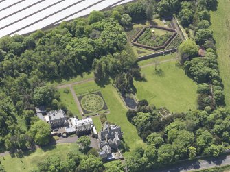 Oblique aerial view of Luffness House, taken from the NNE.