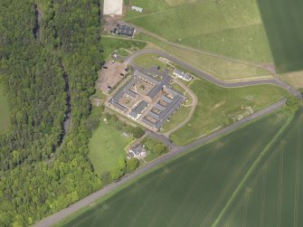 Oblique aerial view of Thurston Home Farm, taken from the SSE.