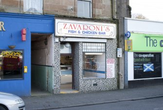 View of tiled shop front to Zavaroni's Fish and Chicken Bar on ground floor of 14 East Princes Street, Rothesay, Bute, from N