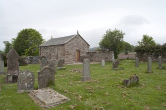 General view of graveyard and morthouse from south west.