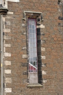 Detail of window to the left of the entrance on south east elevation.