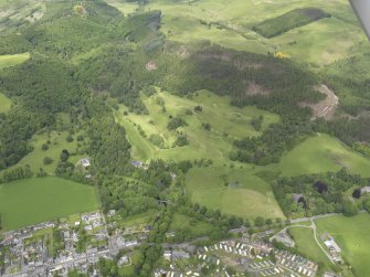 Oblique aerial view of Comrie Golf Course, taken from the SSE.