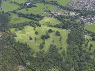 Oblique aerial view of Comrie Golf Course, taken from the NW.