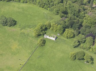 Oblique aerial view of Dowhill Castle, taken from the SE.