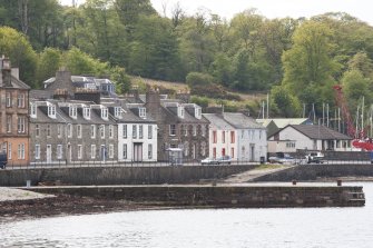 General view from NE showing terraced houses at 59-69 Marine Road, Port Bannatyne, Bute