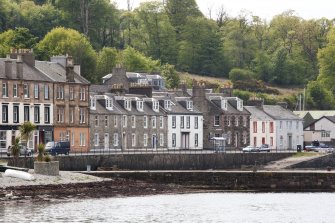 General view from NE showing terraced houses at 59-69 Marine Road, Port Bannatyne, Bute