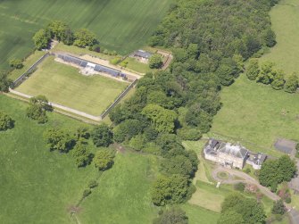 Oblique aerial view of Alderston House and walled garden, taken from the SE.