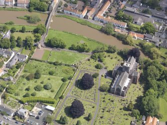 Oblique aerial view of St Mary's Parish Church, taken from the W.