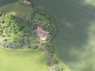 Oblique aerial view of Sandy's Mill, taken from the SE.