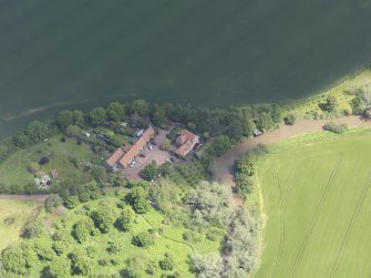 Oblique aerial view of Sandy's Mill, taken from the SW.