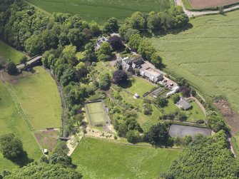 Oblique aerial view of Whittingehame House Stables, taken from the NE.