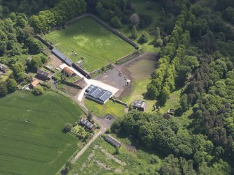 Oblique aerial view of Eastfield Farmstead, taken from the NE.